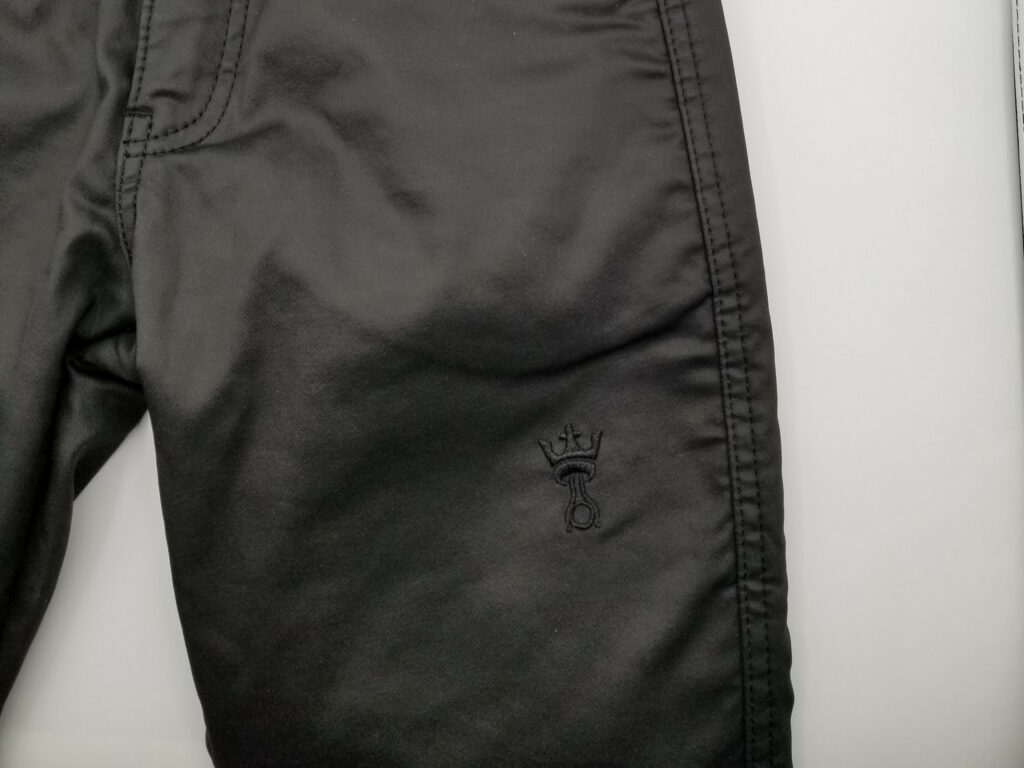 PandoMoto logo embroidery on Left thigh