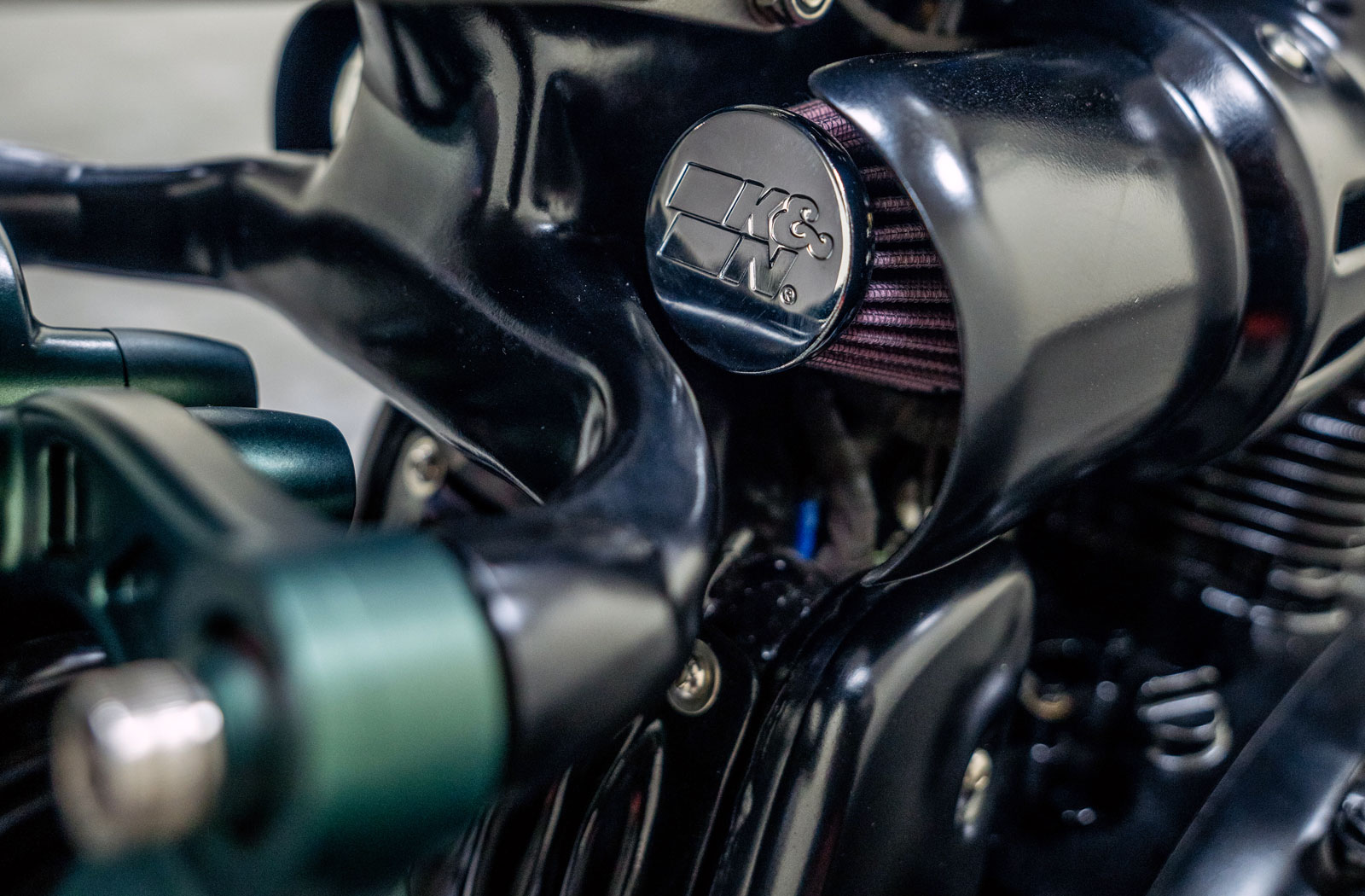 etail photograph of a custom Royal Enfield Shotgun 650 motorcycle K&N air filter intake system